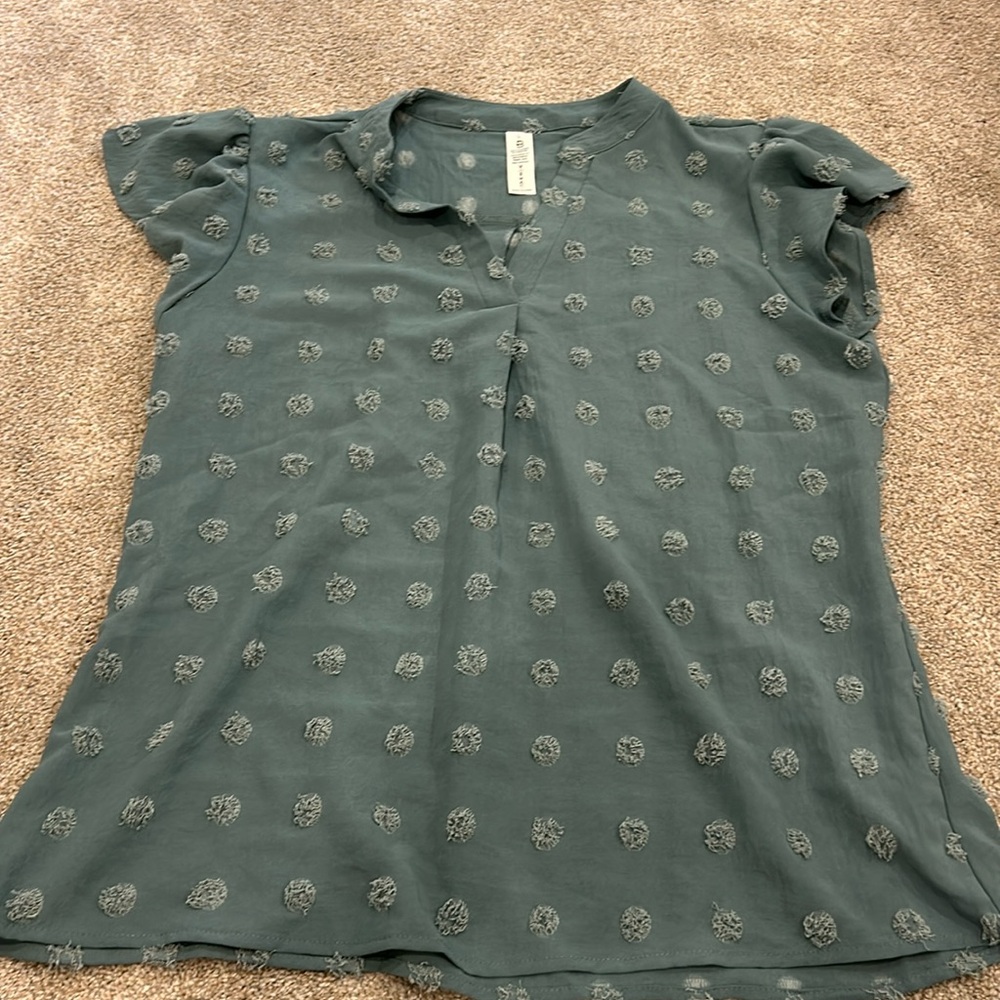 Teal/blue textured top